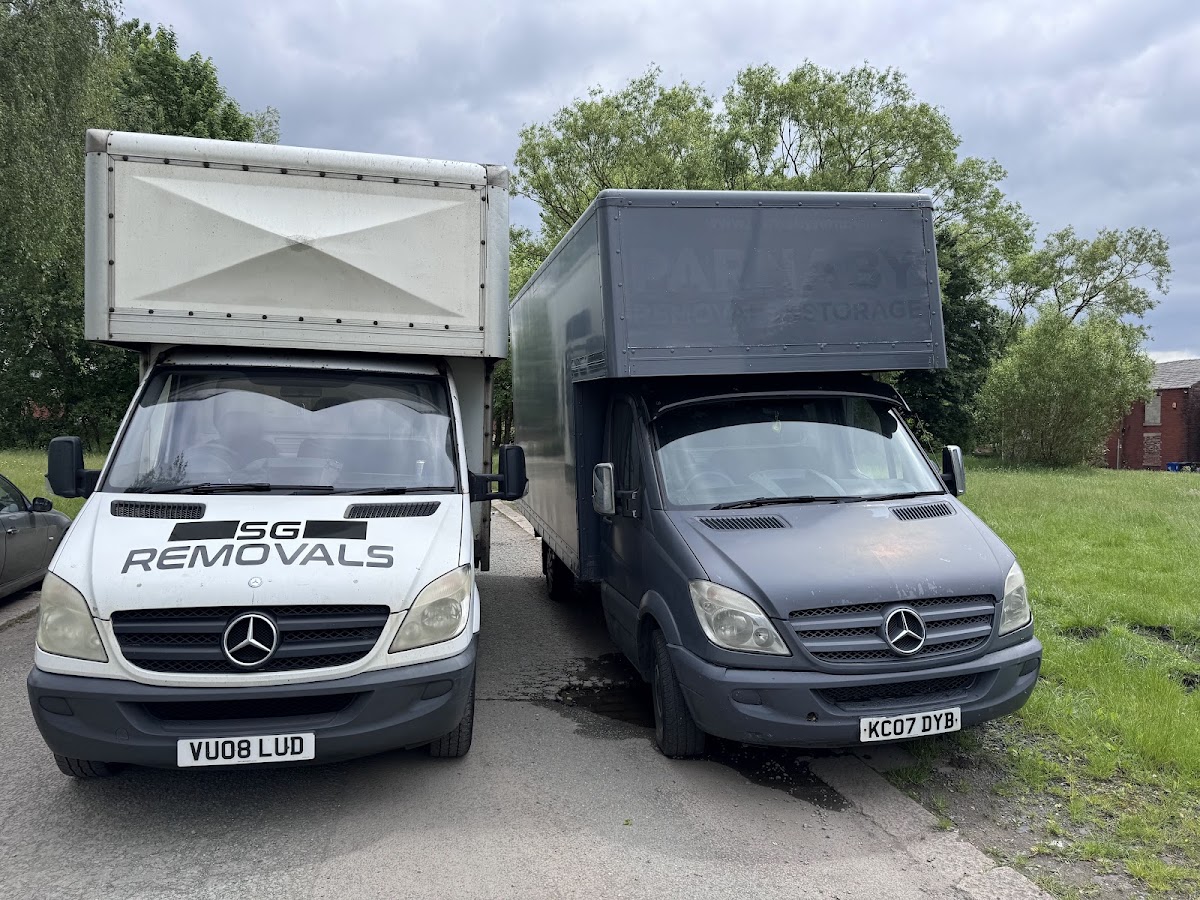 The SG Removals fleet of Mercedes Sprinter Luton vans in Wigan
